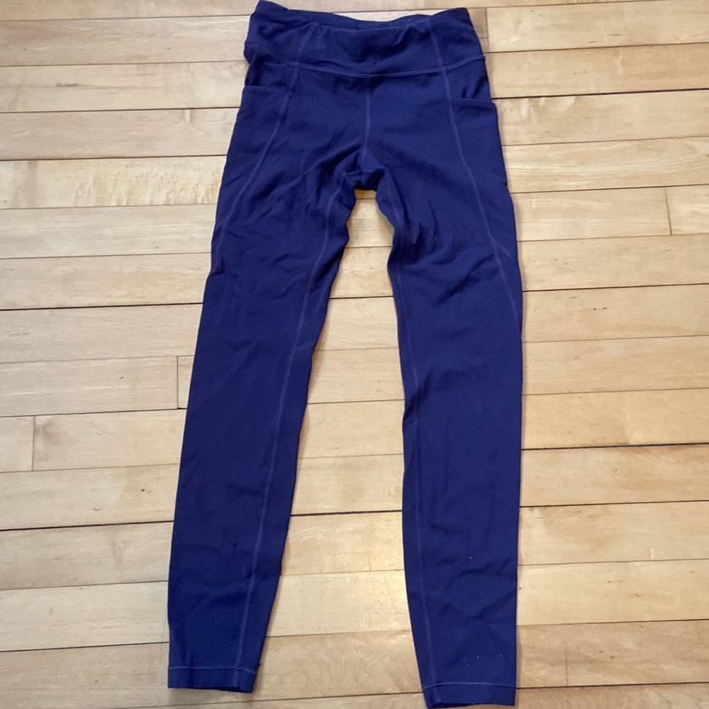 Purple athleta girl tights.  Size 8-10.